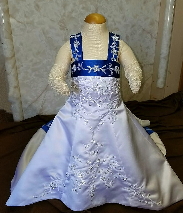 white infant flower girl dress with royal blue