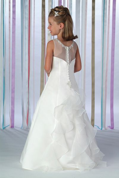 Girls ruffled back flower girl dress. Sheer organza back with covered buttons draped to organza ruffles down the back.