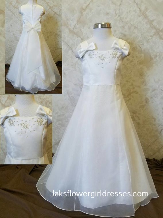 Cheap ivory flower girl dresses.  Beaded Scooped tank bodice accented with a bow on each shoulder strap. Double petticoat and built-in satin slip.