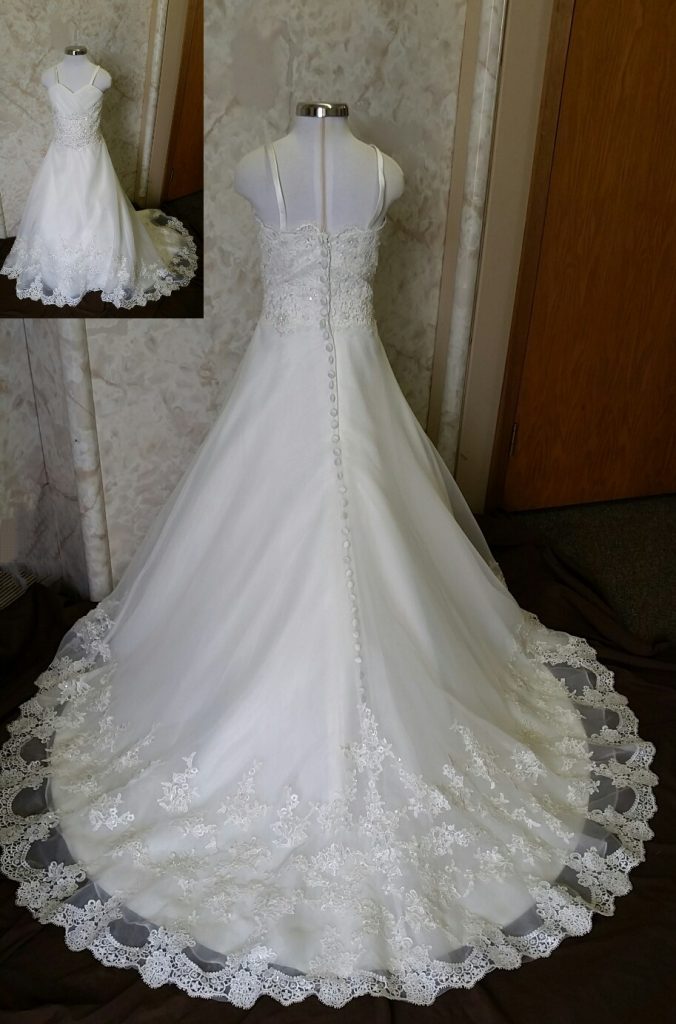 Lace sweetheart flower girl dress with organza lace train.