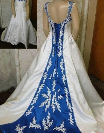 Royal blue and ivory lace flower girl dress with a train.
