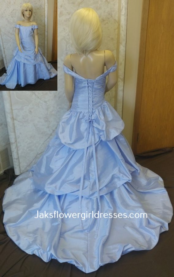 Lavender flower girl dress with pick up skirt and train. Long taffeta off shoulder sleeve dress with corset lace up back.