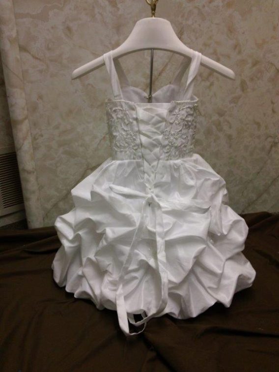 Infant flower girl wedding dress.