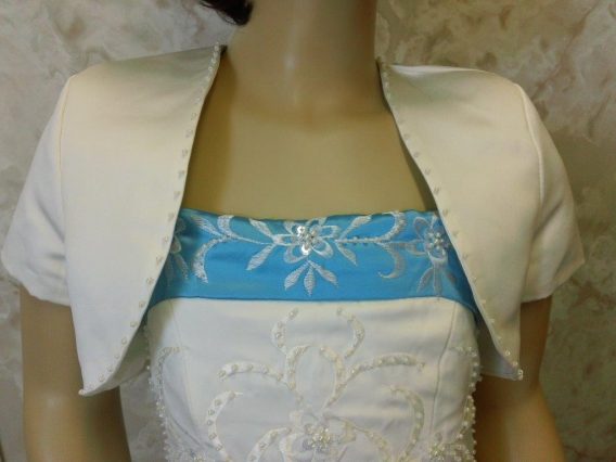 Pool blue and ivory long flower girl dress with jacket.