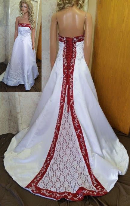 White dress for wedding flower girls. Red trimmed neckline, lace up back and chapel train with beaded embroidery.
