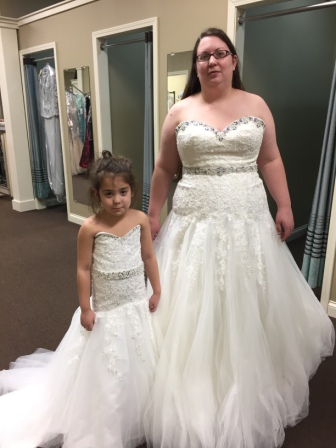 Matching bride and flower girl dresses.