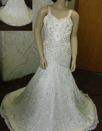 Lace fit and flare flower girl dress accented with crystals.