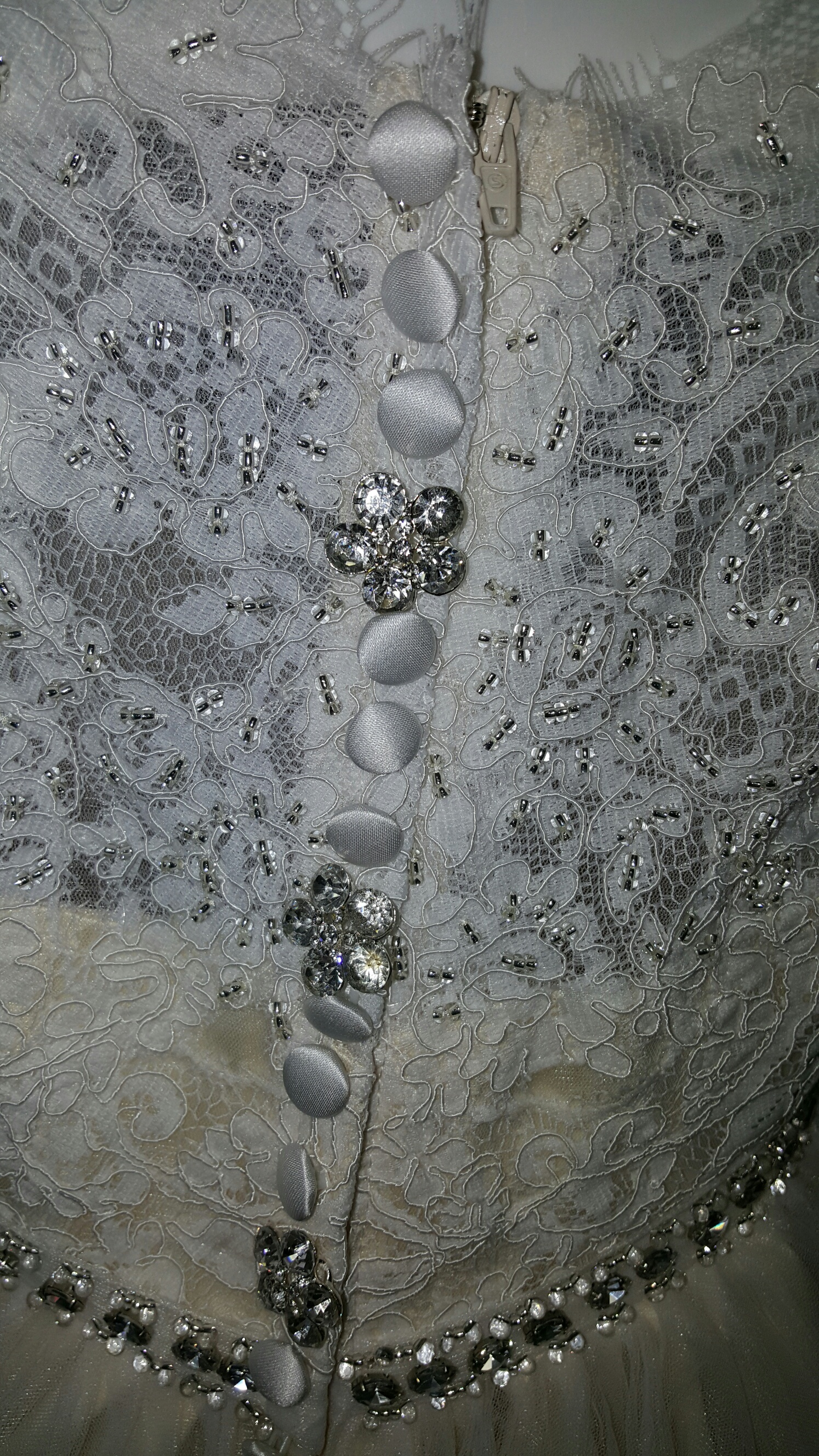 Baby girls wedding flower girl dress with button back over the zipper.