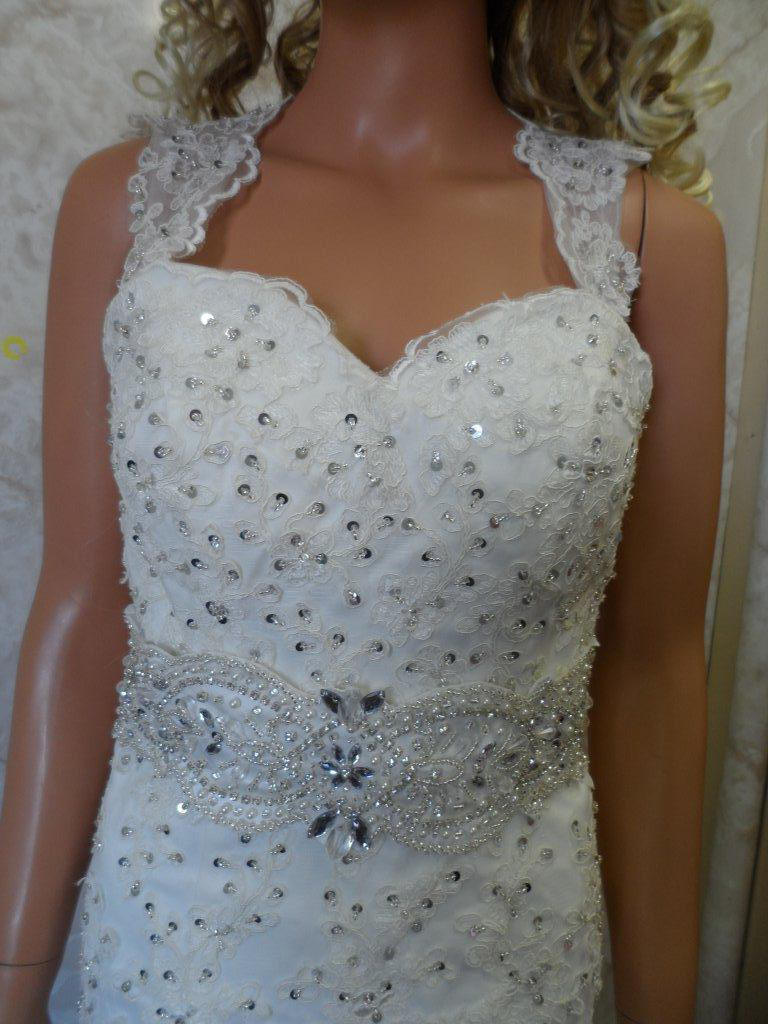 Open back bridal dress with beaded sash