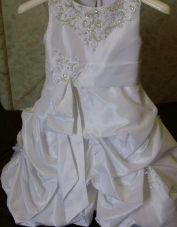 Baby girls wedding dress with beaded lace and pickup skirt.