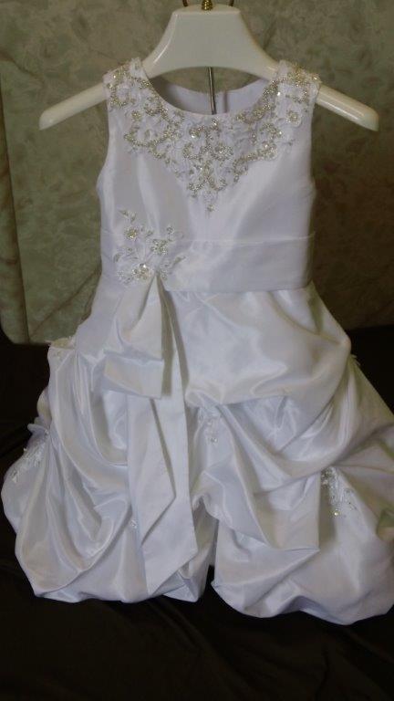 Baby girls wedding dress with beaded lace and pickup skirt.