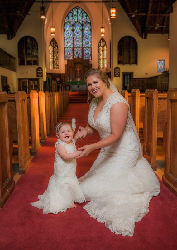 Darling wedding picture of this bride, and her daughter