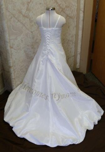 Baby daughters flower girl wedding dress, train says "Here comes my Mom".
