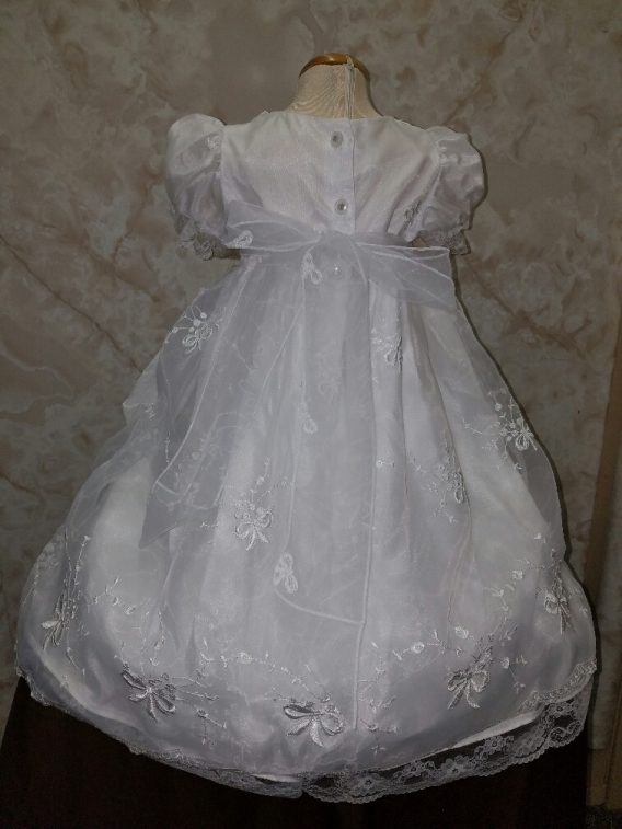 Girl christening dresses on sale at Jaks Bridal. Shop today.