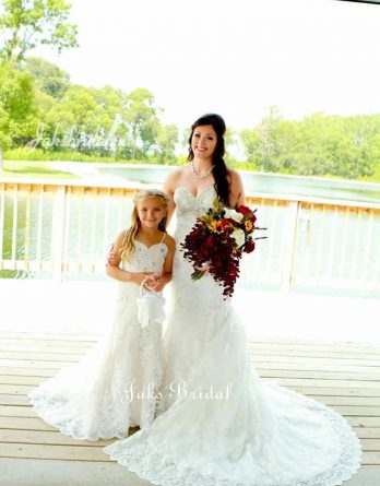 Lace mermaid flower girl dress with fitted sweetheart neck accented with crystals.