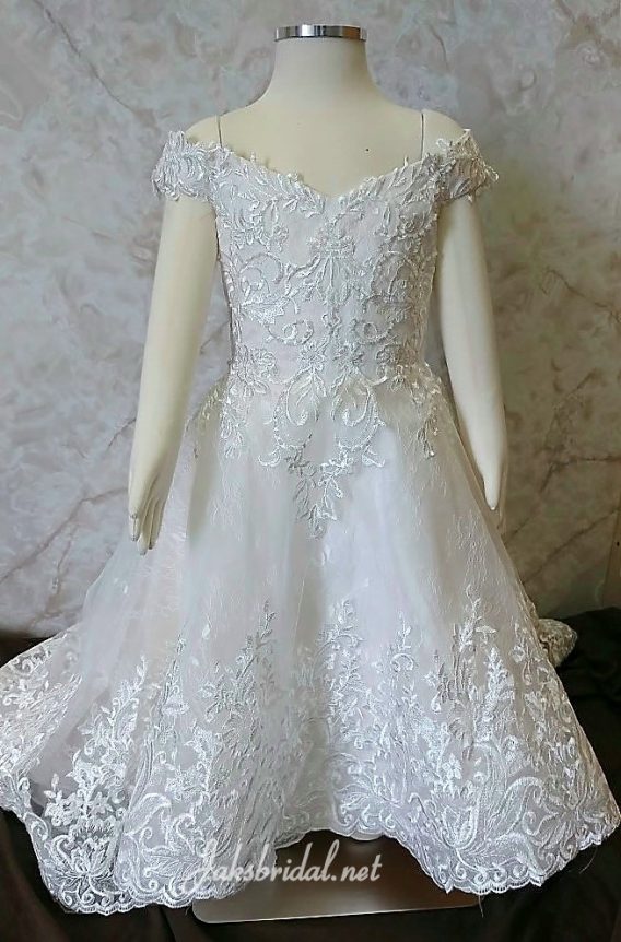 Off shoulder lace flower girl dress is full or elegance and southern charm. 