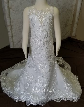 Toddler lace miniature bride dress with illusion jewel neckline, and scalloped lace court train.