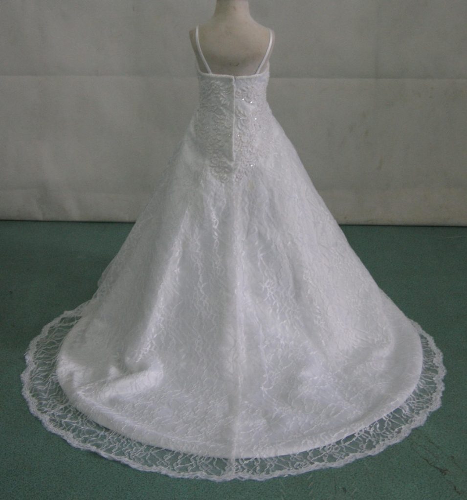 Sweet lace flower girl dress creates a mini bride look.