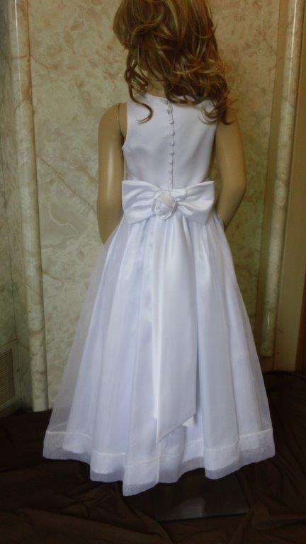 White sleeveless flower girl dresses with a sash rose on back in size 5,6,7,9 on sale for only $40.
