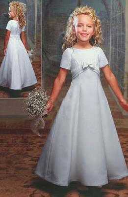 Long white short sleeve flower girl dress, an empire waist with a bow. On sale for $40.