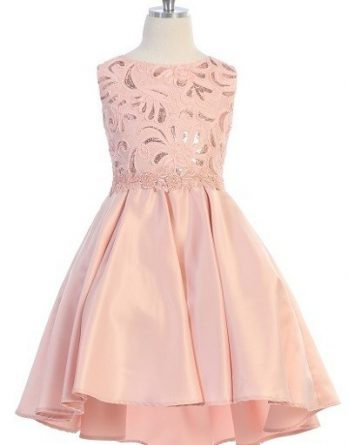 Girls formal blush dresses. Sleeveless dress with round neck, shiny pattern bodice, high low skirt with pleated back.