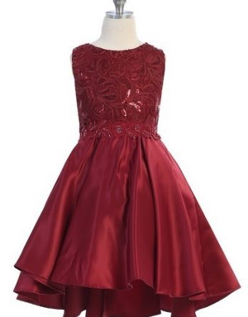 Girls formal burgundy dresses. Sleeveless dress with round neck, shiny pattern bodice, high low skirt with pleated back.
