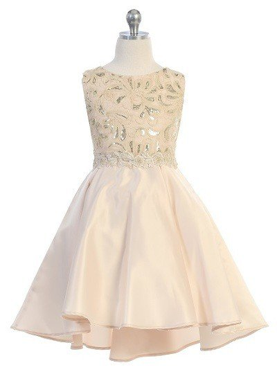 Girls formal champagne dresses. Sleeveless dress with round neck, shiny pattern bodice, high low skirt with pleated back.