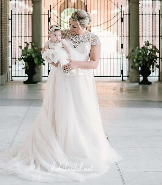 Bride and Young Daughter Dress Alike for the wedding.