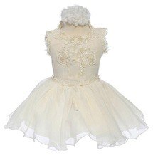 Girls white frilly cupcake pageant dress with an open back on sale for $40.