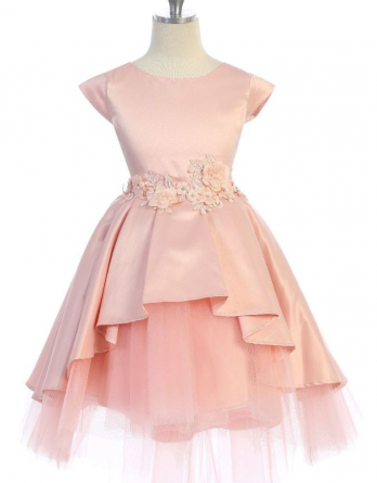 Girls Blush cap sleeve dress has a high low peplum skirt with tiered tulle underlay. Flower waist accent, and sash back.