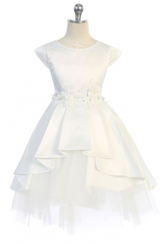 Girls Ivory cap sleeve dress has a high low peplum skirt with tiered tulle underlay. Flower waist accent, and sash back.