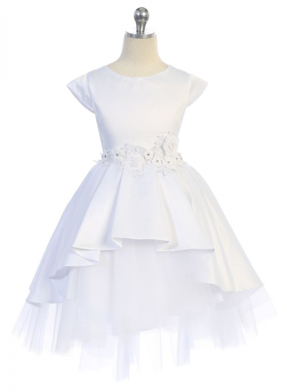 Girls White cap sleeve dress has a high low peplum skirt with tiered tulle underlay. Flower waist accent, and sash back.