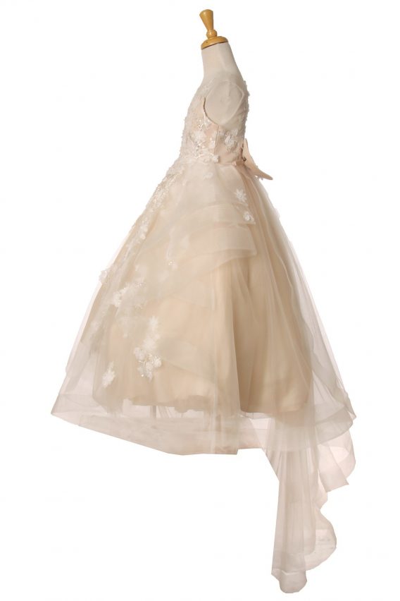 High low dress for flower girls. Hand-crafted lace appliques with sequins and bow back. Hi-low train has 3D lace flowers.