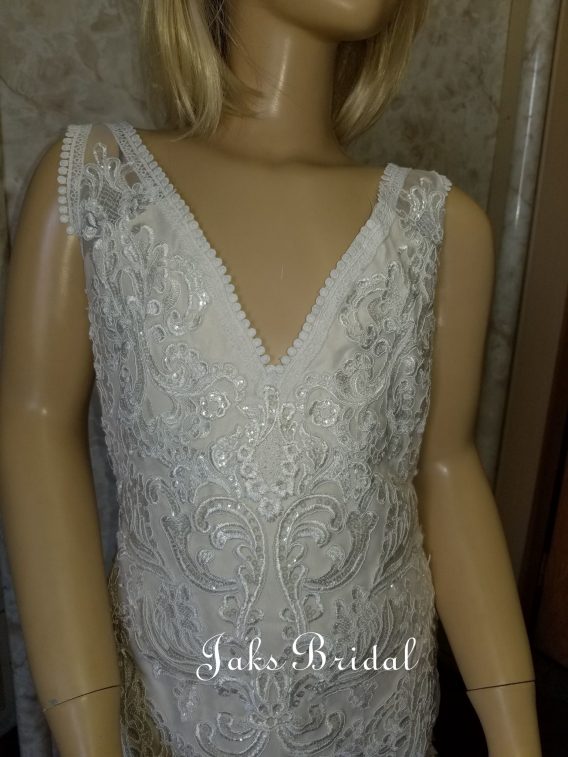 Lace open back flower girl dress with angel wing train.