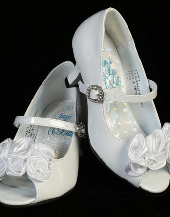 girls white heel shoe with roses on the toe