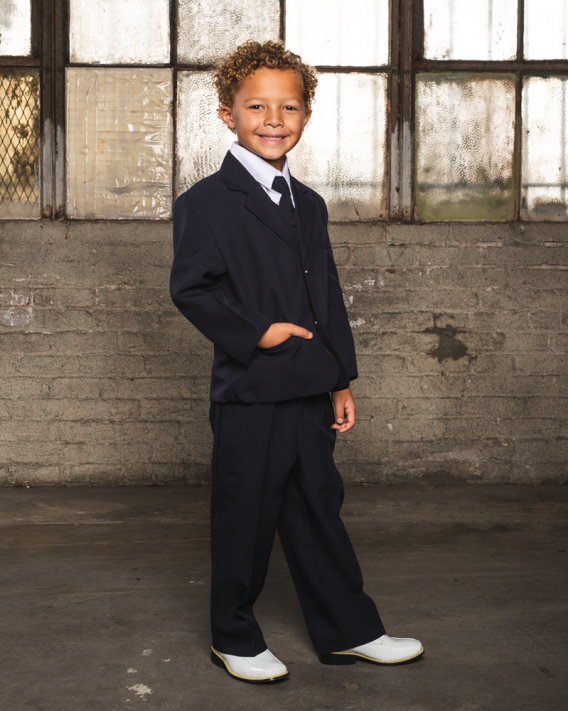 Find stylish and adorable navy-colored boys' suits at Jaks and get your little guys dressed to impress. Find button-down dress shirts, dress pants, and 5-piece suit sets.