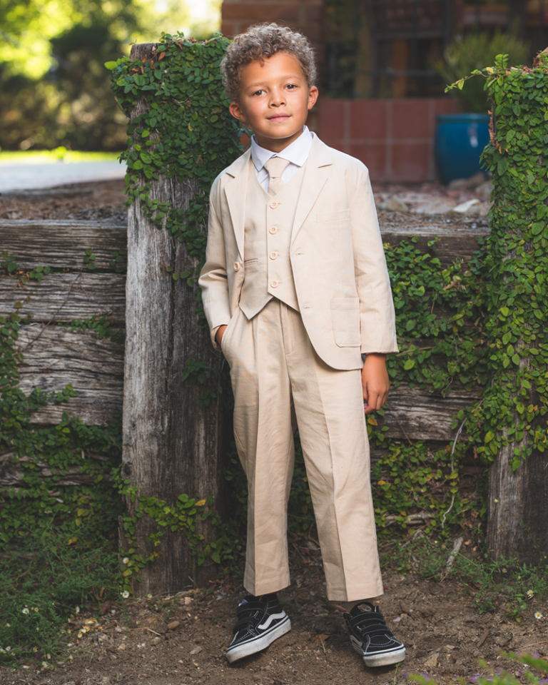 Boys new sand-colored suits. Boys size 0-7.