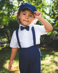 Indigo Suspender outfit. Boy suspender set includes shorts with matching suspenders and bow tie, and a white short-sleeve shirt.