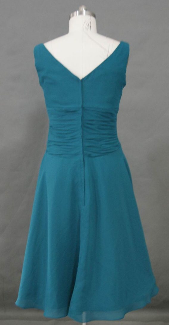 V-Neck Short Teal Chiffon A-line Bridesmaid Dress with an Empire Waistline accented with a Brooch.