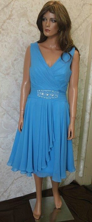 V-Neck Short Blue Chiffon A-line Bridesmaid Dress with an Empire Waistline accented with a Brooch.