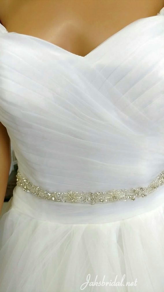 Ruched bodice wedding gown with beaded sash.