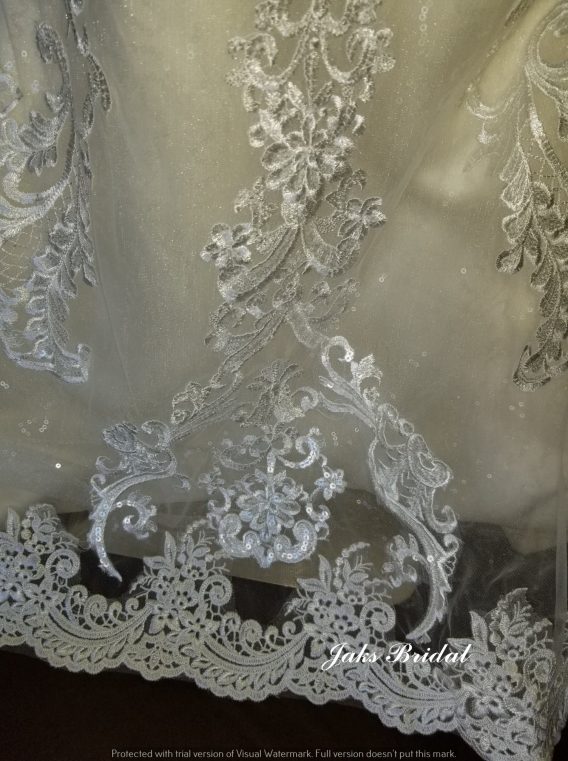 lace insets and elaborate hand-detailed lace