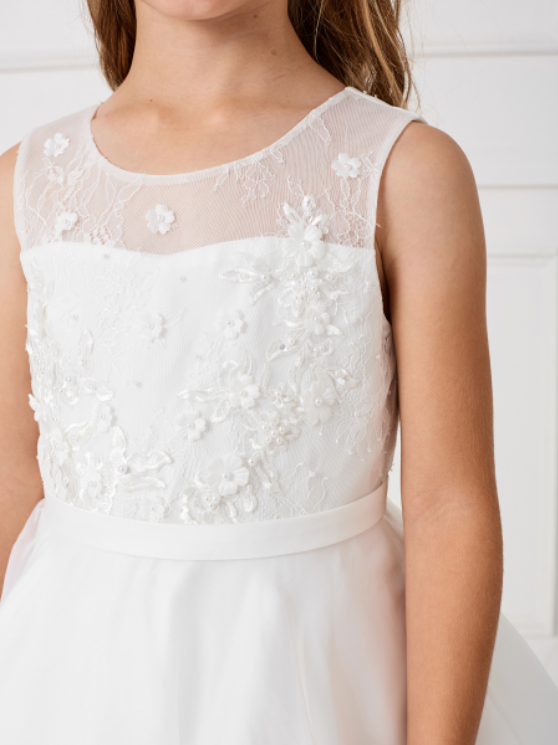 A flattering plus-size Communion Dress with illusion neck design and lace applique bodice