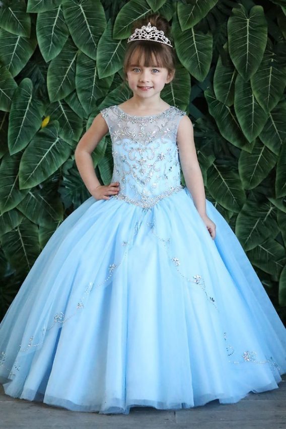 Blue sleeveless girl's ball gown has an embellished bodice, illusion neckline, and voluminous skirt