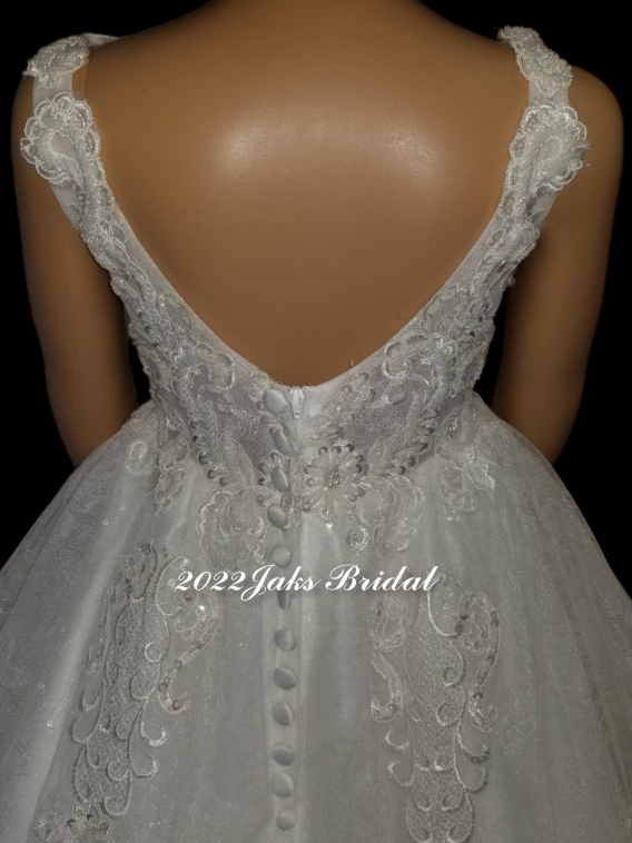 White pearl tulle over sequined tulle.