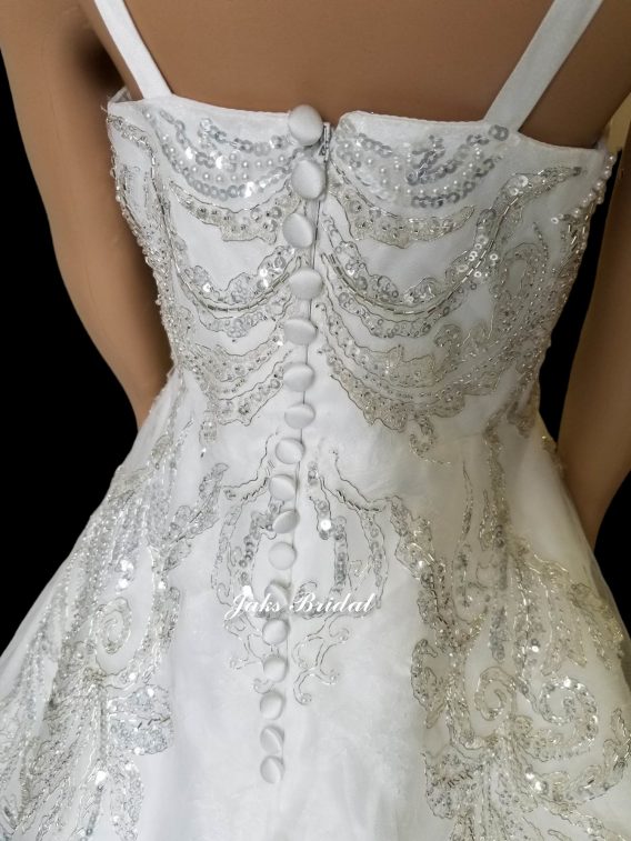 Children's size lace wedding gowns.